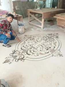 alt="Luxury home interior featuring a custom MarbleHaqArts marble inlay floor medallion as a centerpiece"